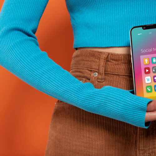 image of lady holding phone in hands